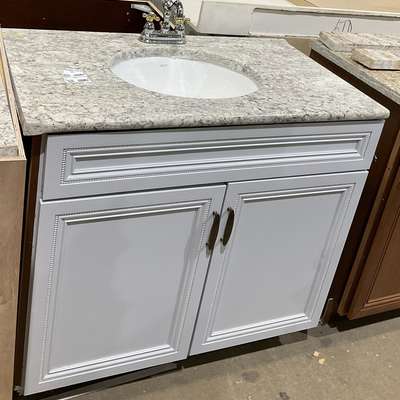 granite topped  vanity with sink