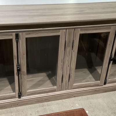 glass-doored entertainment center